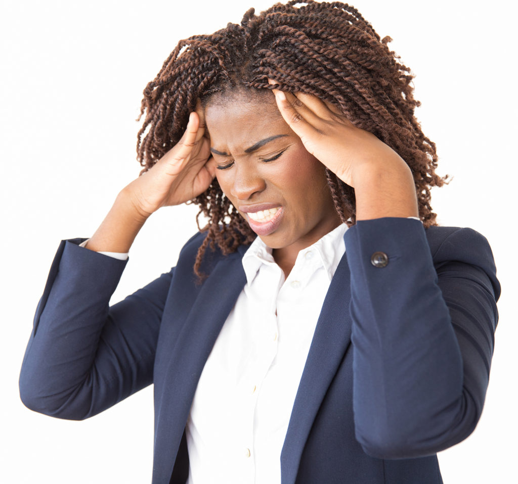 Stressed unhappy female employee suffering from headache. Young black business woman with pain face and closed eyes standing over studio background, holding head and temples. Health problem concept